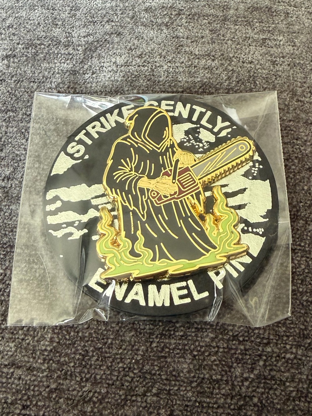 Strike Gently Gold Reaper with Chainsaw Enamel Pin